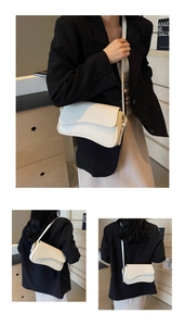 Detail of the irregular wave flap and lychee grain leather on the off-white crossbody bag