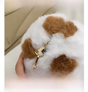 Detailed close-up of fluffy faux fur texture and golden metal zipper on plush round bag