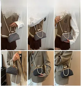 Detailed views of polka dot kiss-lock shoulder bag with elegant pearl strap styles