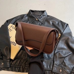 Dark brown pebble leather crossbody bag with flap cover and retro gold hardware