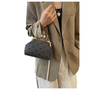 Retro grey herringbone pattern crossbody bag with black polka dots and pearl strap