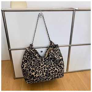 Large leopard print canvas tote bag with stylish silver metal chain shoulder strap