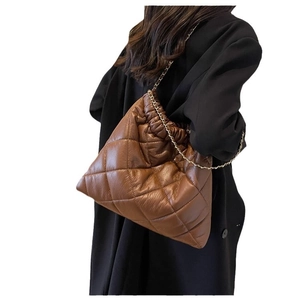 Brown quilted chain shoulder bag with minimalist embroidered texture and gold metal strap