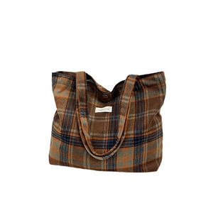 Classic plaid woolen tote bag in brown and orange tones with stylish top handles