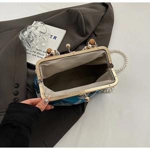 Vintage navy blue embroidery kiss-lock bag with wood handle and pearl strap