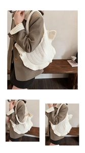 Detailed side view of white knitted ruffle shoulder bag on a model in a warm room