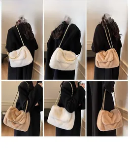 Detailed view of plush faux fur shoulder bag with gold chain strap in white and camel colors