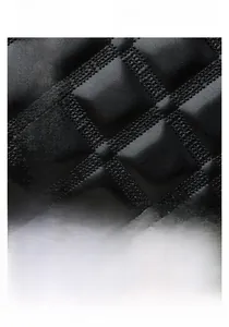Detail view of black quilted leather shoulder bag with gold rectangular swivel lock buckle
