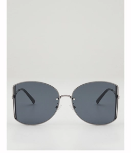 Detail of slim silver metal frame and dark gray lenses on large square sunglasses