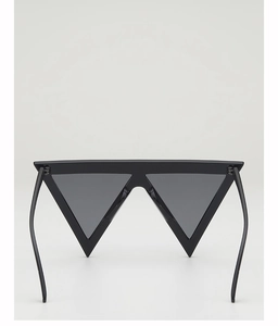 Detailed view of trendy geometric triangle sunglasses in sleek black minimalist frame