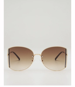 Detail of butterfly metal frame sunglasses with brown gradient lenses on white background