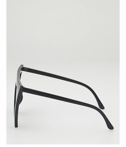 Side view of black flat top oversized sunglasses with wide temples and glossy finish