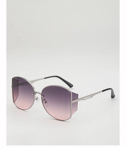 Detail of silver oversized sunglasses with gradient pink lenses and unique side shields
