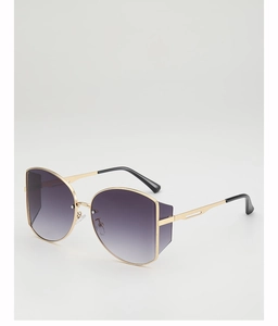 Detail of oversized gold metal sunglasses with purple gradient lenses and side shields