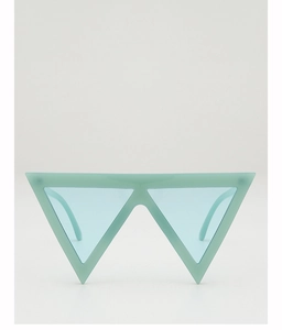 Detailed front view of mint green geometric triangle sunglasses with translucent frames