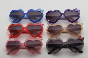 Détails de lunettes de soleil cœur pour enfants en six couleurs pailletées avec nœuds