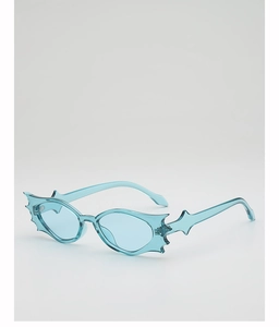 Close-up of sky blue jelly-tinted bat-wing sunglasses with serrated jagged edge frames
