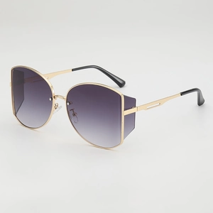 Retro oversized metal sunglasses with purple gradient lenses shown at a 45-degree angle