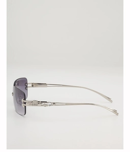 Detail of silver metal temples with hollow stars and heart motifs on Y2K sunglasses