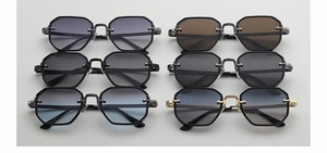 Détails de plusieurs lunettes de soleil octogonales en métal aux couleurs variées