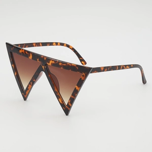 Fashionable oversized triangle sunglasses with tortoise shell frames and brown lenses