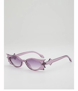 Close-up of purple gradient bat-wing shaped lenses with sharp gothic edge design