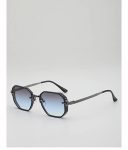 Détail des branches texturées et verres dégradés bleu-gris sur ces lunettes octogonales