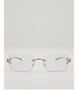 Detail view of Y2K rimless square sunglasses with silver star decor and metal frame