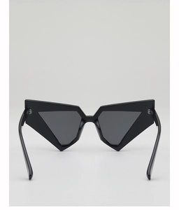 Front view of black geometric punk sunglasses with bold sharp polygon frames and dark grey lenses
