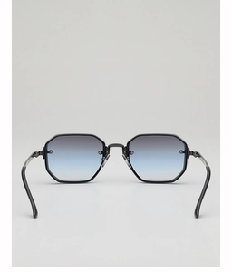 Vue détaillée des lunettes de soleil octogonales avec verres dégradés et charnière métal