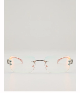 Detail of rimless square sunglasses with star accents and blue rhinestone temples