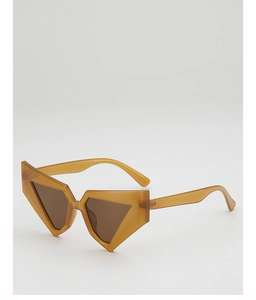 Detailed side view of geometric pentagon sunglasses with translucent amber frames