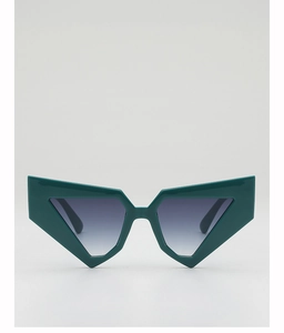 Detail of chunky dark green geometric sunglasses with dark grey gradient lenses