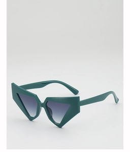 Macro detail of dark green geometric sunglasses with thick frames and gradient lenses