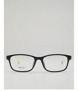 Détail de la monture TR90 bicolore noir et blanc avec accents jaunes et design carré