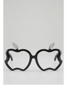Detail of creative apple-shaped children's eyewear frame with decorative green leaves