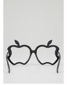 Detail of apple-shaped black glossy plastic decorative glasses frames for kids