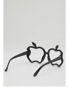 Close-up of black apple-shaped kids eyeglass frame in a glossy plastic finish