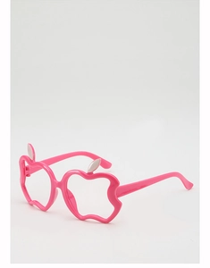Detailed side view of pink apple-shaped kids eyeglass frames with white leaf accents