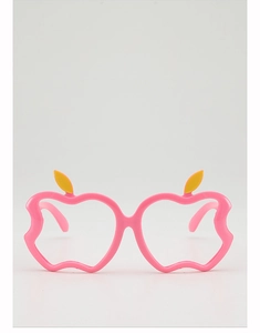 Detailed close-up of pink apple-shaped glasses frame with yellow leaf for kids costume