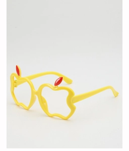 Detail of yellow apple-shaped decorative eyeglass frames with red leaf accents for kids