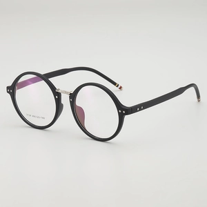Vintage black round eyeglasses frame with silver bridge and signature stripe detail