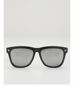 Close-up of black sunglasses featuring silver mirror lenses and star rivets on the frame