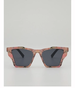 Close-up of pink floral pattern frames and gray lenses on trendy polygon sunglasses