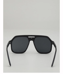 Close-up of navy blue pilot sunglasses with double-bridge frame and UV400 lenses