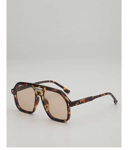 Detail view of tortoiseshell aviator sunglasses with double bridge and silver star accent