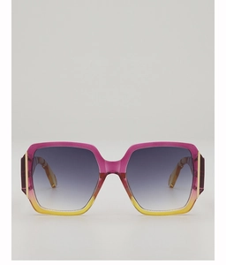 Macro view of square oversized sunglasses featuring purple yellow gradient frame and lens