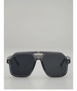 Close-up of navigator sunglasses with navy blue frames and silver bridge detail