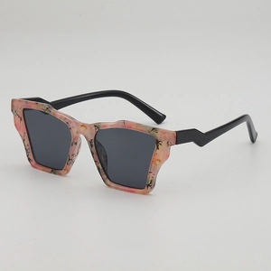 Pink leopard cat eye sunglasses with wavy frames and unique lightning shaped temples