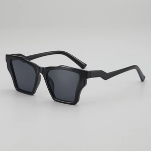 Black melting effect cat eye sunglasses with irregular wavy frames and dark lenses